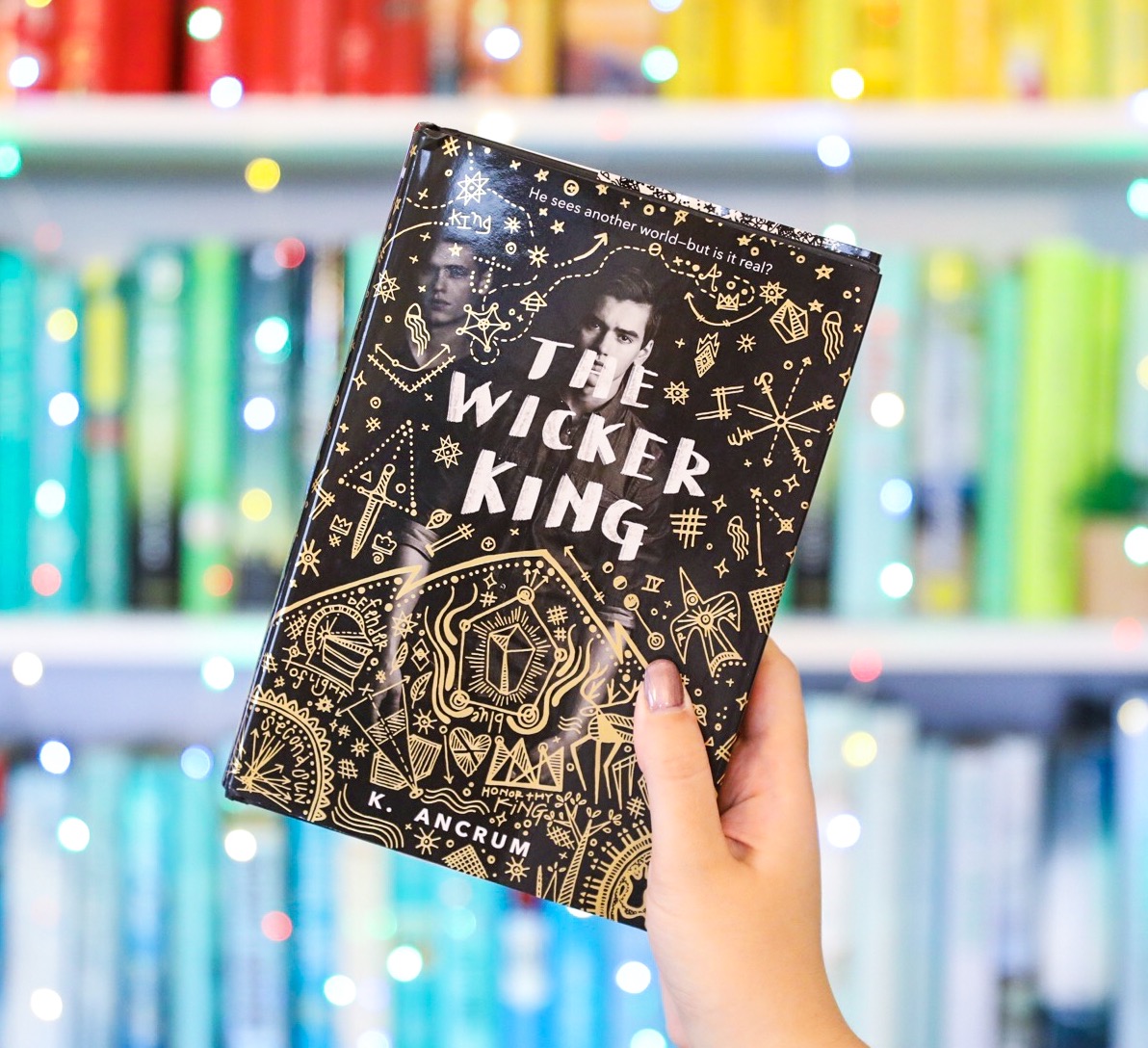 This book yet. This book. The Wicker King book Art.